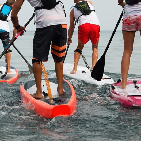 Stand up paddle group on the sea